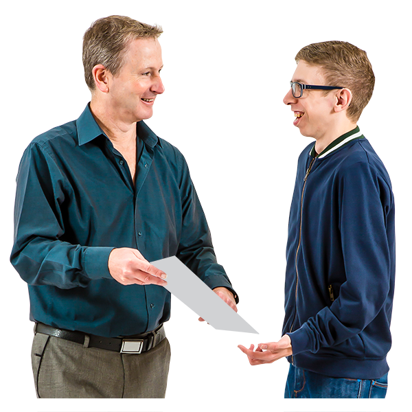a man shows another a piece of paper. they are both smiling