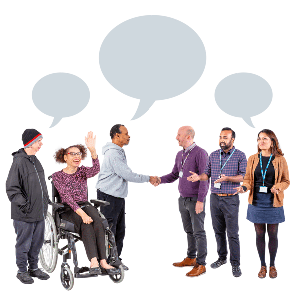 a group of people with disabilities talk to professionals. two men are shaking hands. there are speech bubbles above their heads